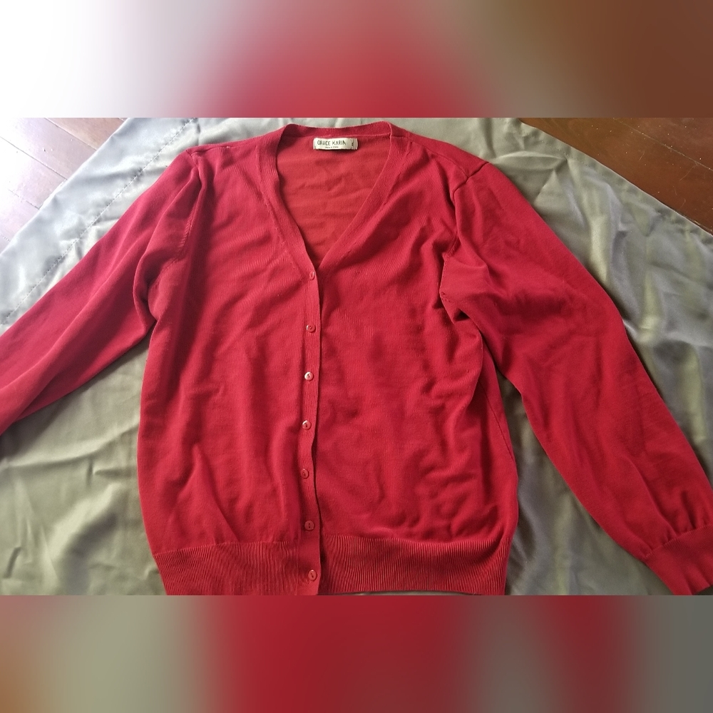 V-neck Cardigan smoke free home, runs a little small